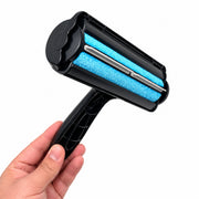 JollyGoods Pet Hair Remover held in hand showing product scale and blue roller surface